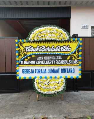 Papan Bunga Duka di Langko